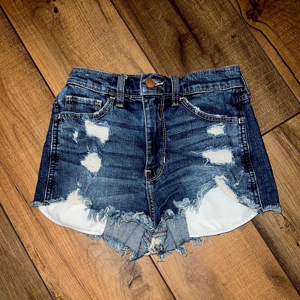 Ripped blue Jean shorts